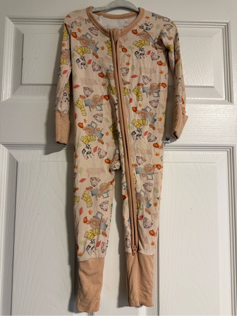 Beige Kids Pumpkin & Toy Print Footed One-Piece Pajamas